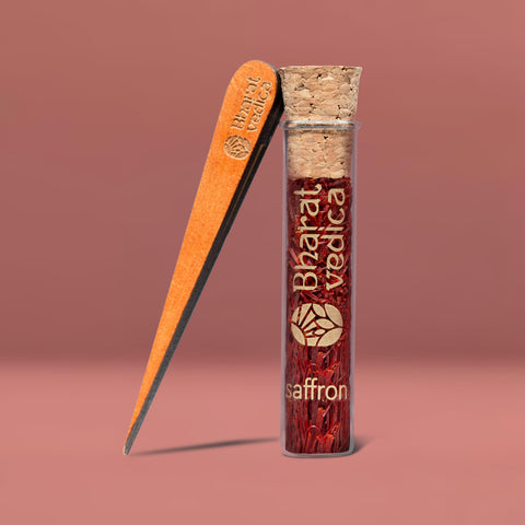 A small jar of high-quality Bharat Vedica Kashmir Saffron threads.