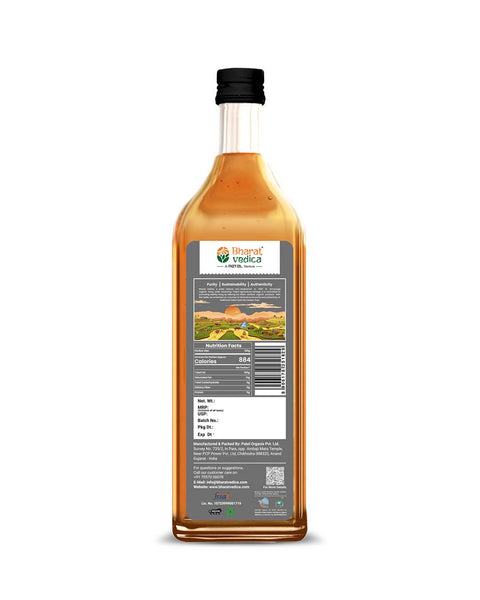 Bottle of Bharat Vedica Organic Wood Pressed Black Mustard Oil with packaging label on a white background