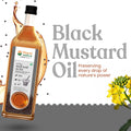 Bottle of Bharat Vedica Organic Wood Pressed Black Mustard Oil with a label and mustard plant on a white background