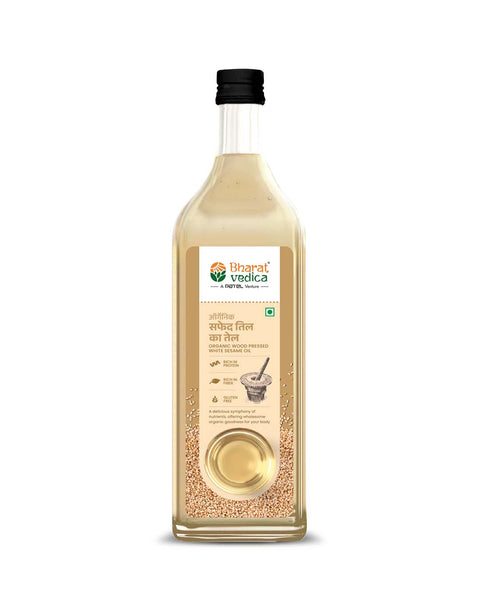 Bottle of Bharat Vedica Organic Wood Pressed White Sesame Oil on a white background