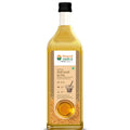 Bottle of Bharat Vedica organic wood pressed yellow mustard oil on a white background