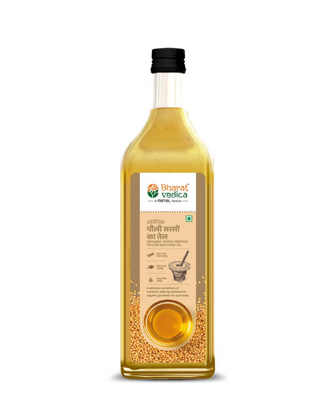 Bottle of Bharat Vedica organic wood pressed yellow mustard oil on a white background