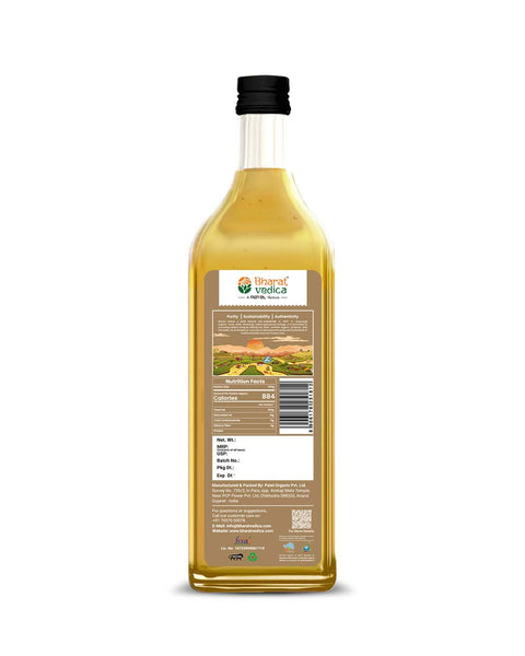 Back view of bottle of Bharat Vedica organic wood pressed yellow mustard oil