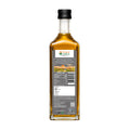 Bottle of Bharat Vedica Organic Wood Pressed Black Mustard Oil with packaging label on a white background.