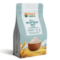Bharat Vedica Organic Khapli Wheat Flour Packet.  Shop Now for Ancient Grain Goodness! This light blue and white packet features the Bharat Vedica brand logo, Hindi and English text for Organic Khapli Wheat Flour, and an image of Khapli wheat flour in a bowl. The packet highlights "Growing Bharat Organically" and "Providing Wholesome, Nutrient-Rich & Delicious Food for Your Body."  Purchase this ancient grain flour online today for healthy and delicious baking.