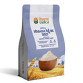 A light purple and white packet of Bharat Vedica brand Organic Lokwan Wheat Flour, with text in both Hindi and English. The packet features the brand logo at the top and an image of wheat grains at the bottom. The text on the packet reads "ऑर्गेनिक लोकवान गेहूँ का आटा ORGANIC LOKWAN WHEAT FLOUR" and "Providing Wholesome, Nutrient-Rich & Delicious Food for Your Body".