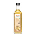 Bottle of Bharat Vedica Organic Wood Pressed White Sesame Oil on a white background.